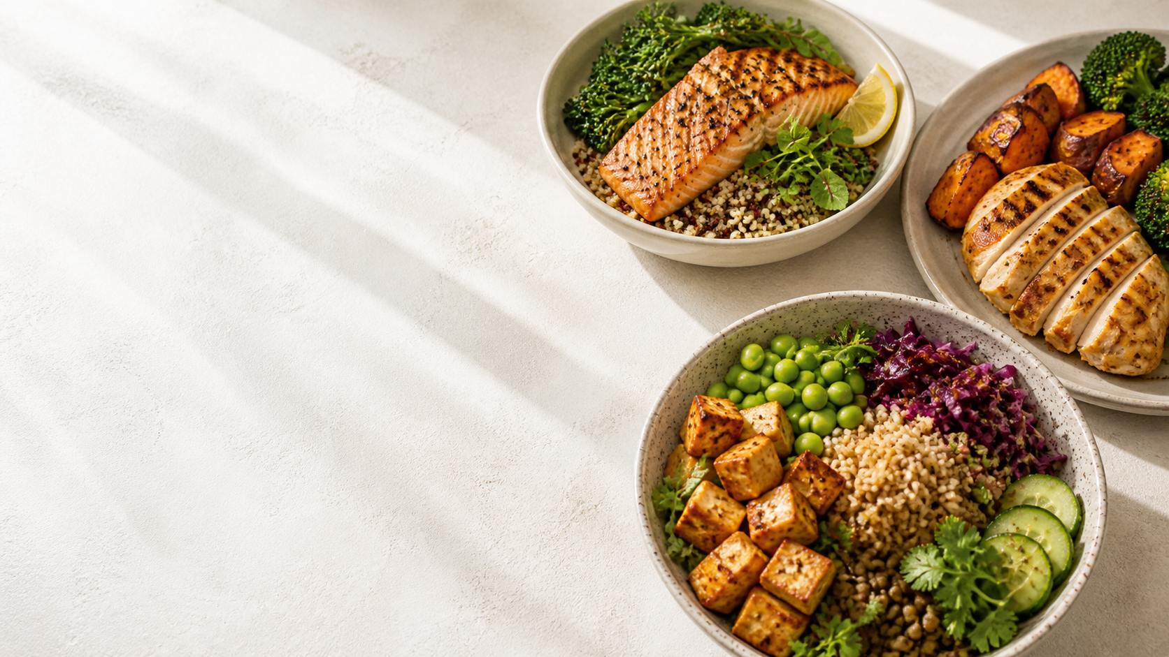 Three balanced high-protein meals with salmon, grilled chicken, tofu, grains, and vegetables